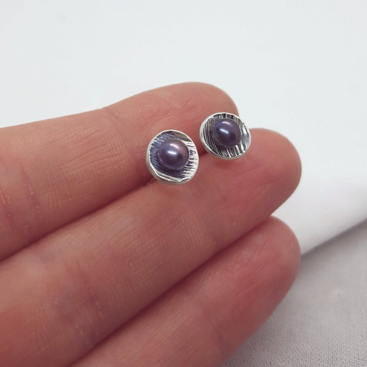 peacock freshwater pearl and textured silver handmade earrings