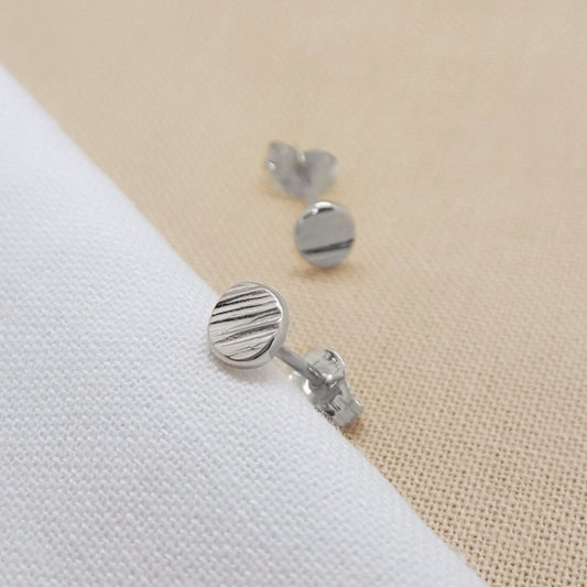 Mini textured stud earrings handmade from recycled silver