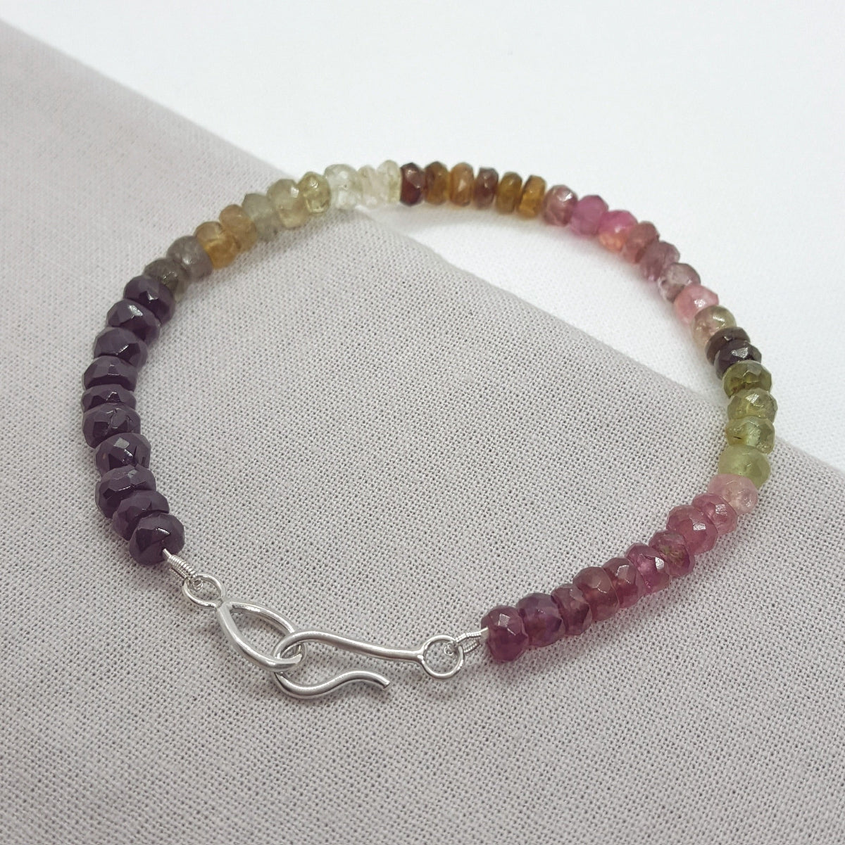 multi coloured tourmaline bracelet with a handmade silver clasp