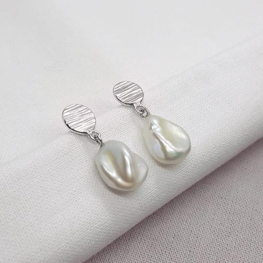 white keshi pearl silver textured detailed drop earrings, handmade jewellery in Kent