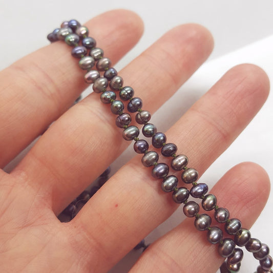 peacock potato freshwater pearl necklace hand knotted on silk thread.