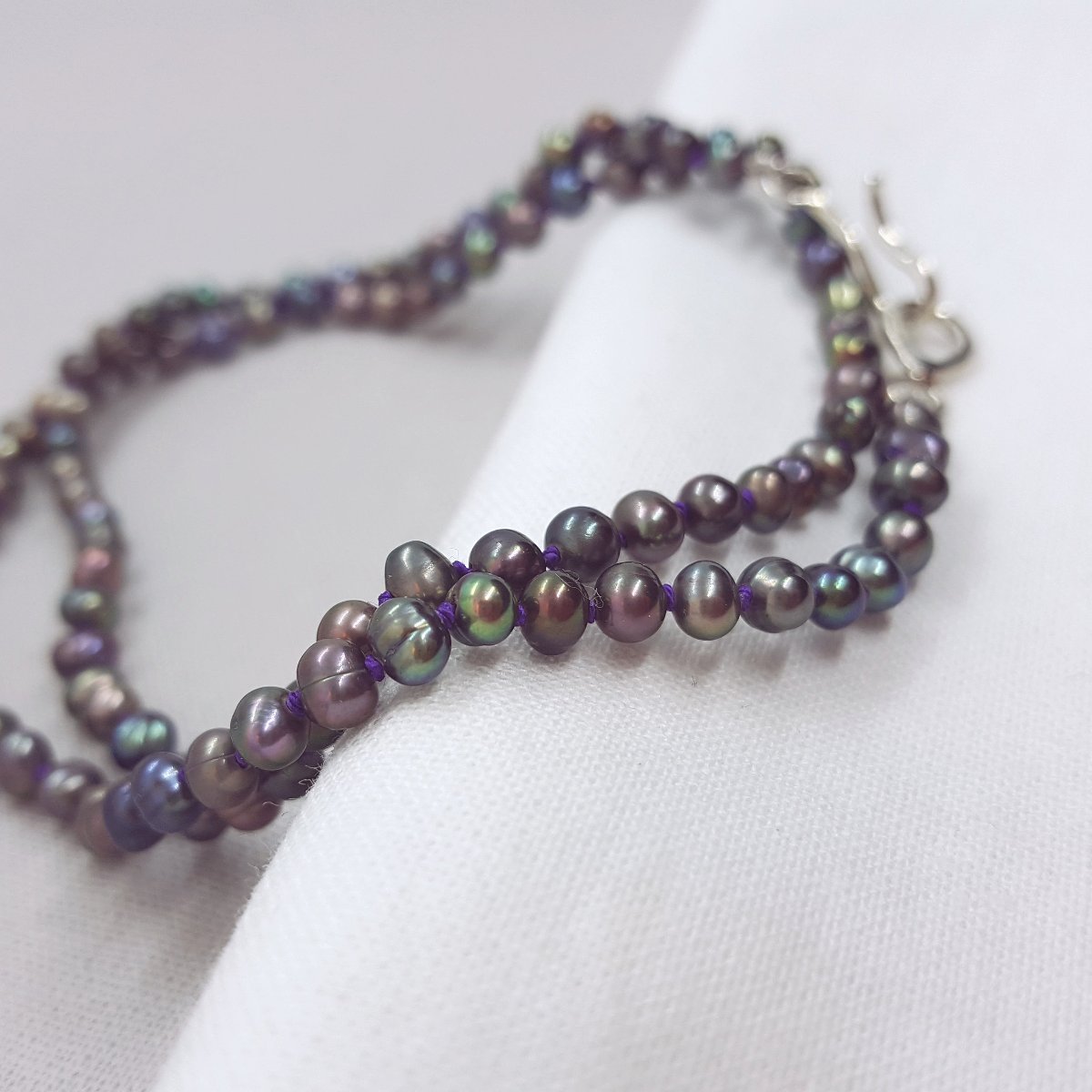 Peacock Pearl Hand Knotted on Purple Silk Necklace - Katherine Seaman Jewellery