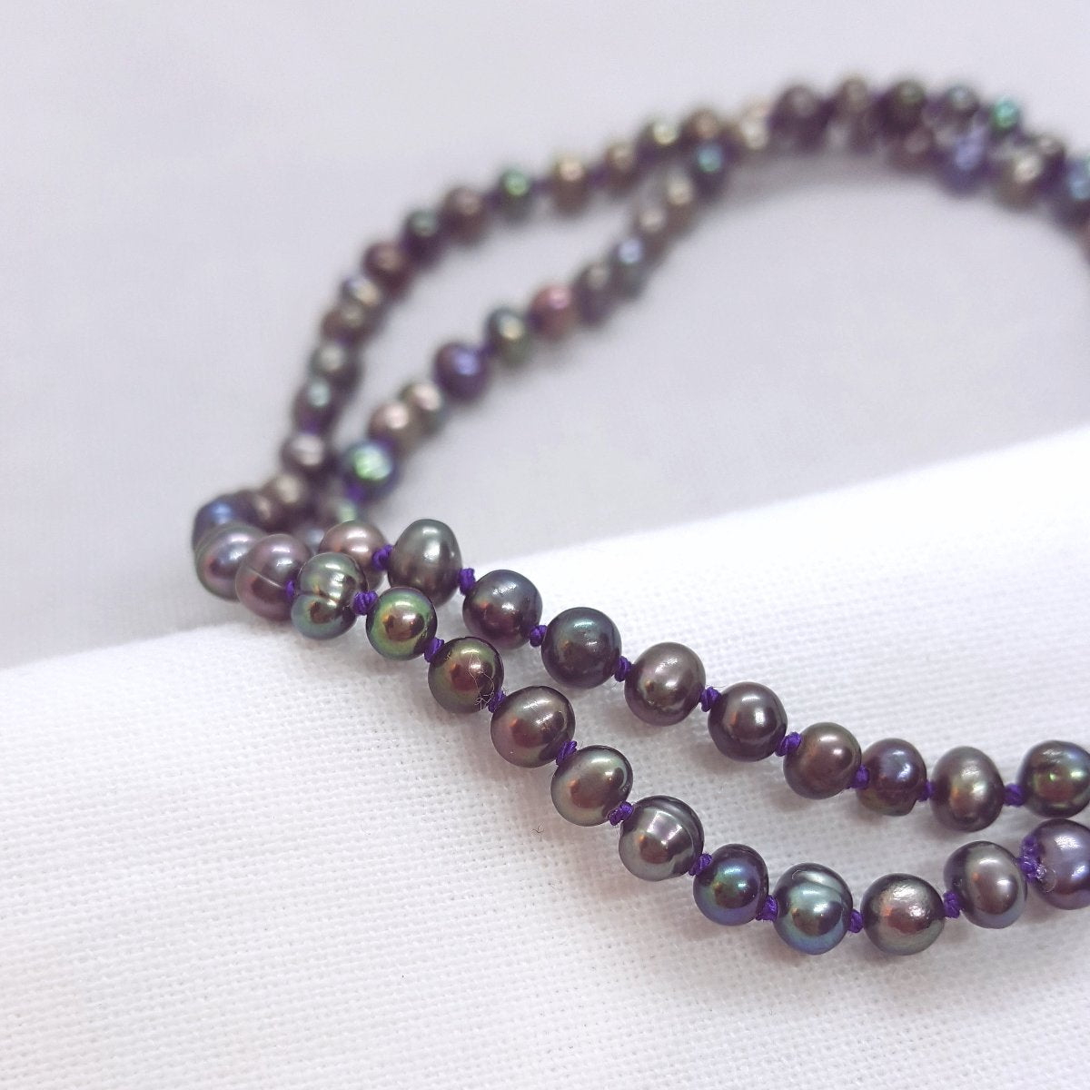 Peacock Pearl Hand Knotted on Purple Silk Necklace - Katherine Seaman Jewellery