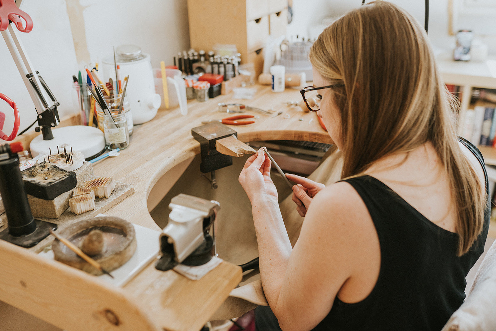 katherine seaman working at her jewellery bench