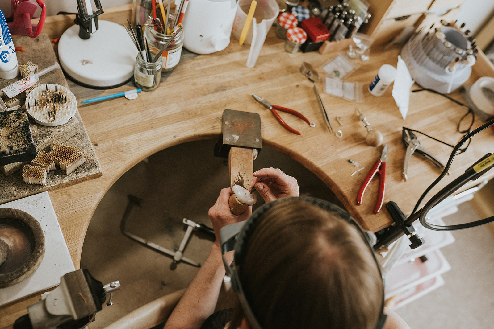Katherine Seaman handmaking jewellery at her bench