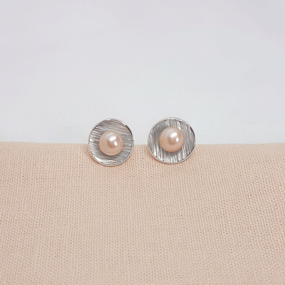 large silver handmade peach freshwater pearl earrings with textured cups