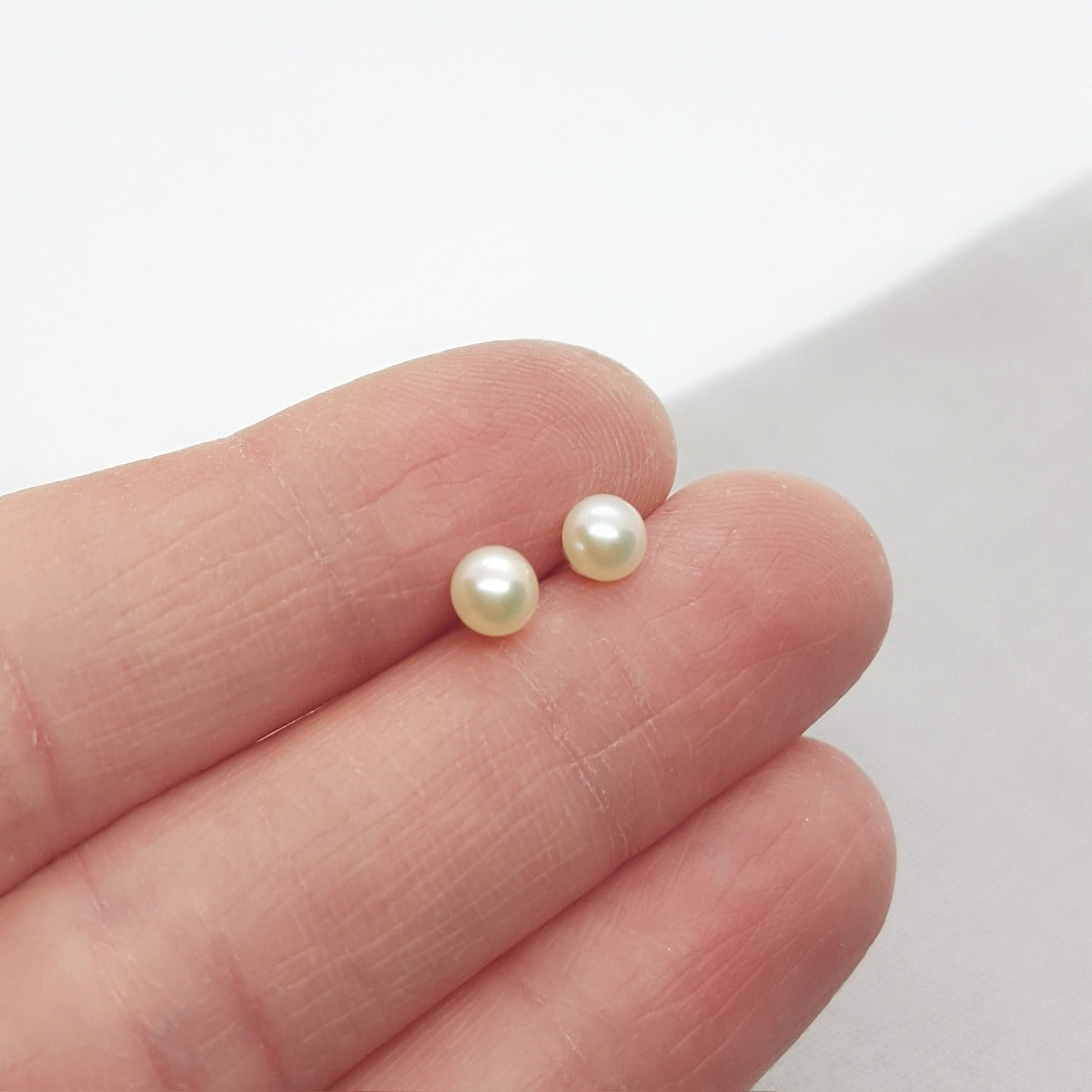 mini white freshwater pearl studs