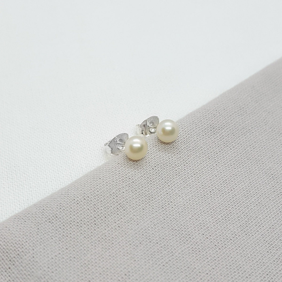 mini white freshwater pearl studs