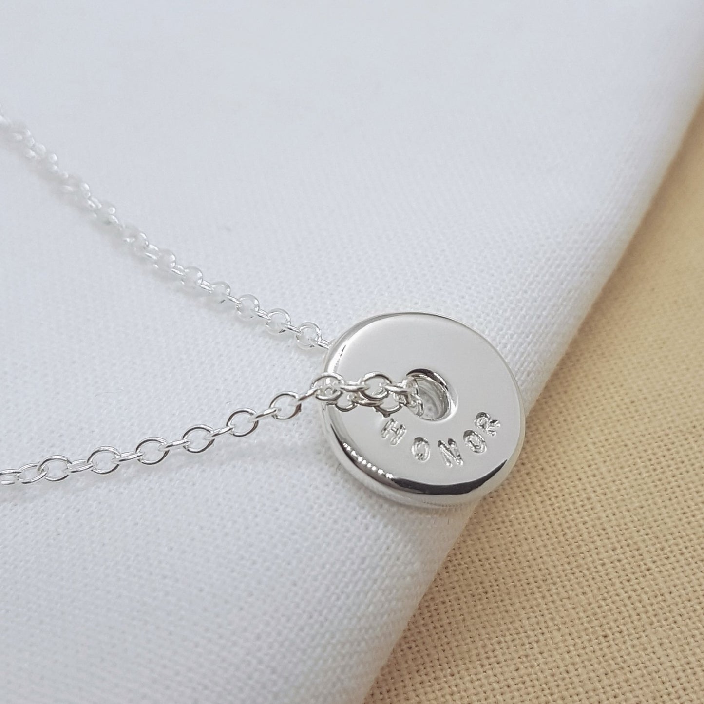 Personalised silver spinner necklace, handmade in Kent