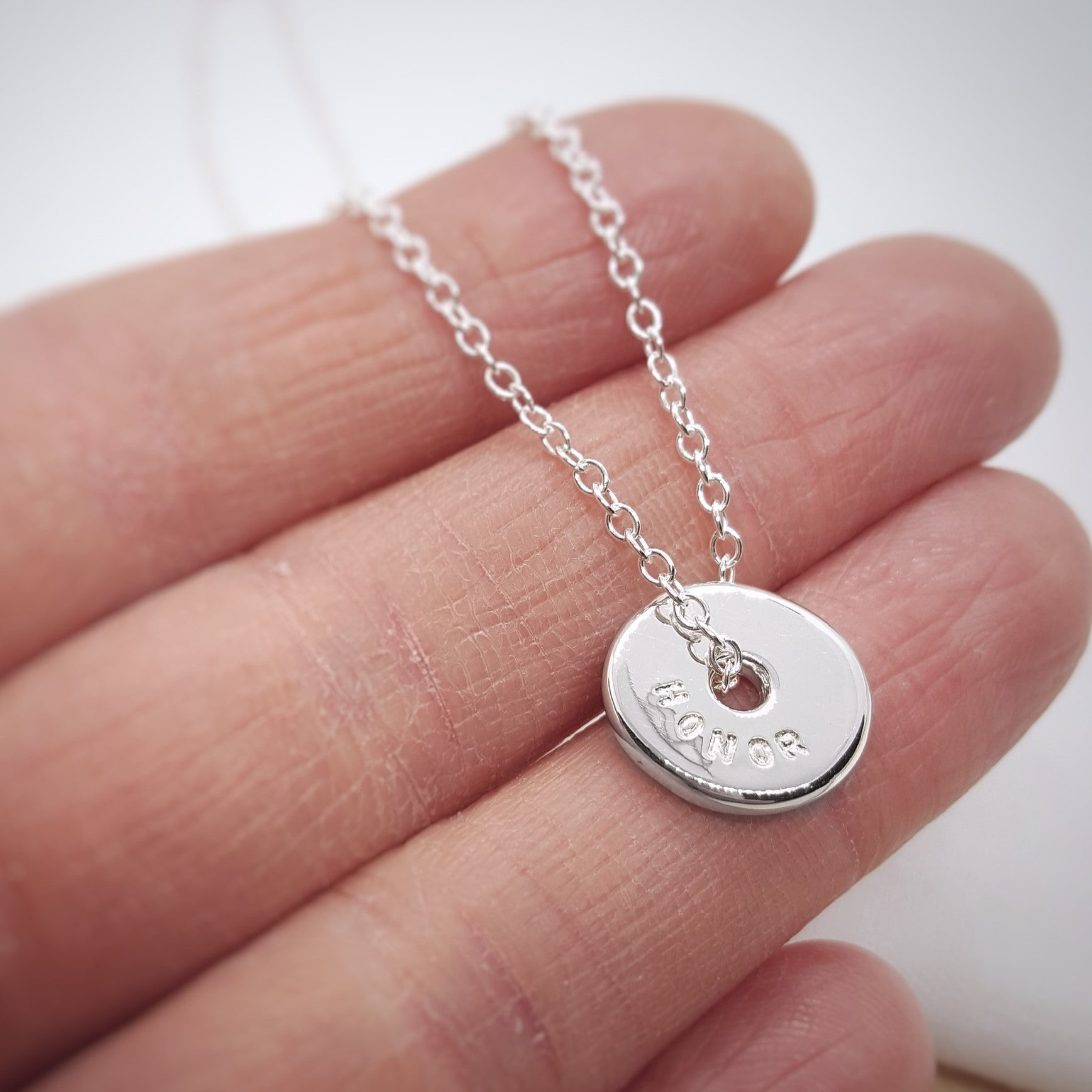 Personalised silver spinner necklace, handmade in Kent