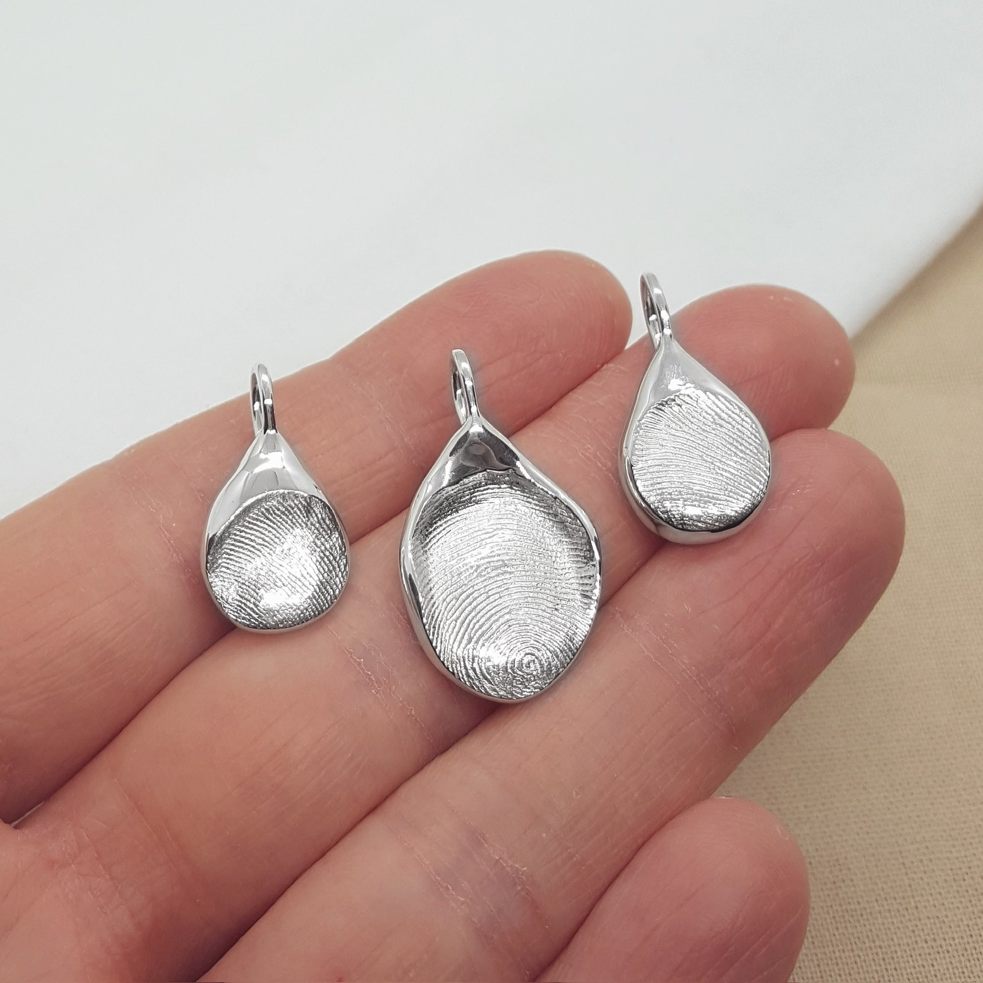 solid silver handmade from a direct imprint of a fingerprint
