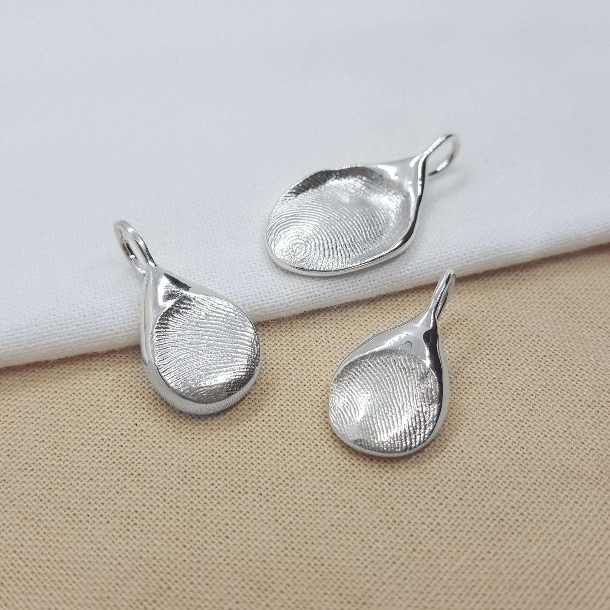 solid silver handmade from a direct imprint of a fingerprint