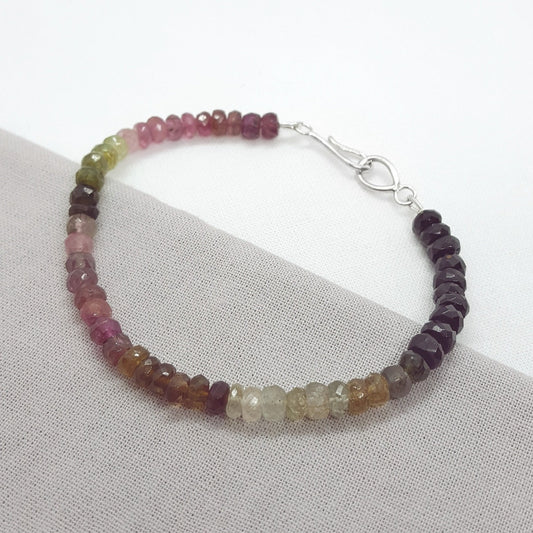 Multi coloured rondelle shaped tourmaline bracelet with a handmade silver clasp, handmade in Kent