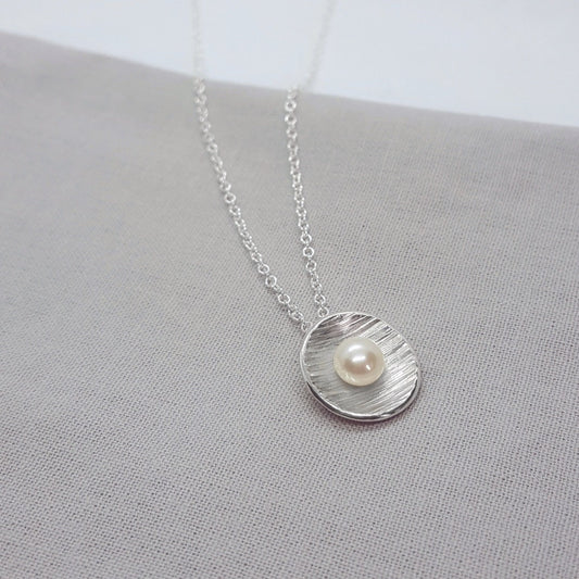 White pearl and silver handmade pendant