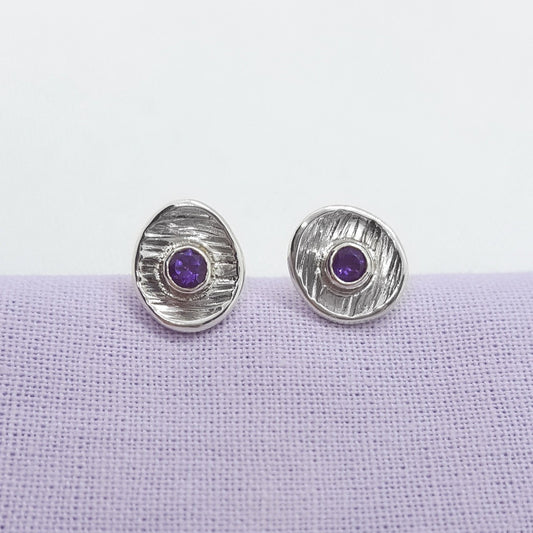 faceted amethyst gemstones set in textured sterling silver cup earrings, handmade jewellery in Kent