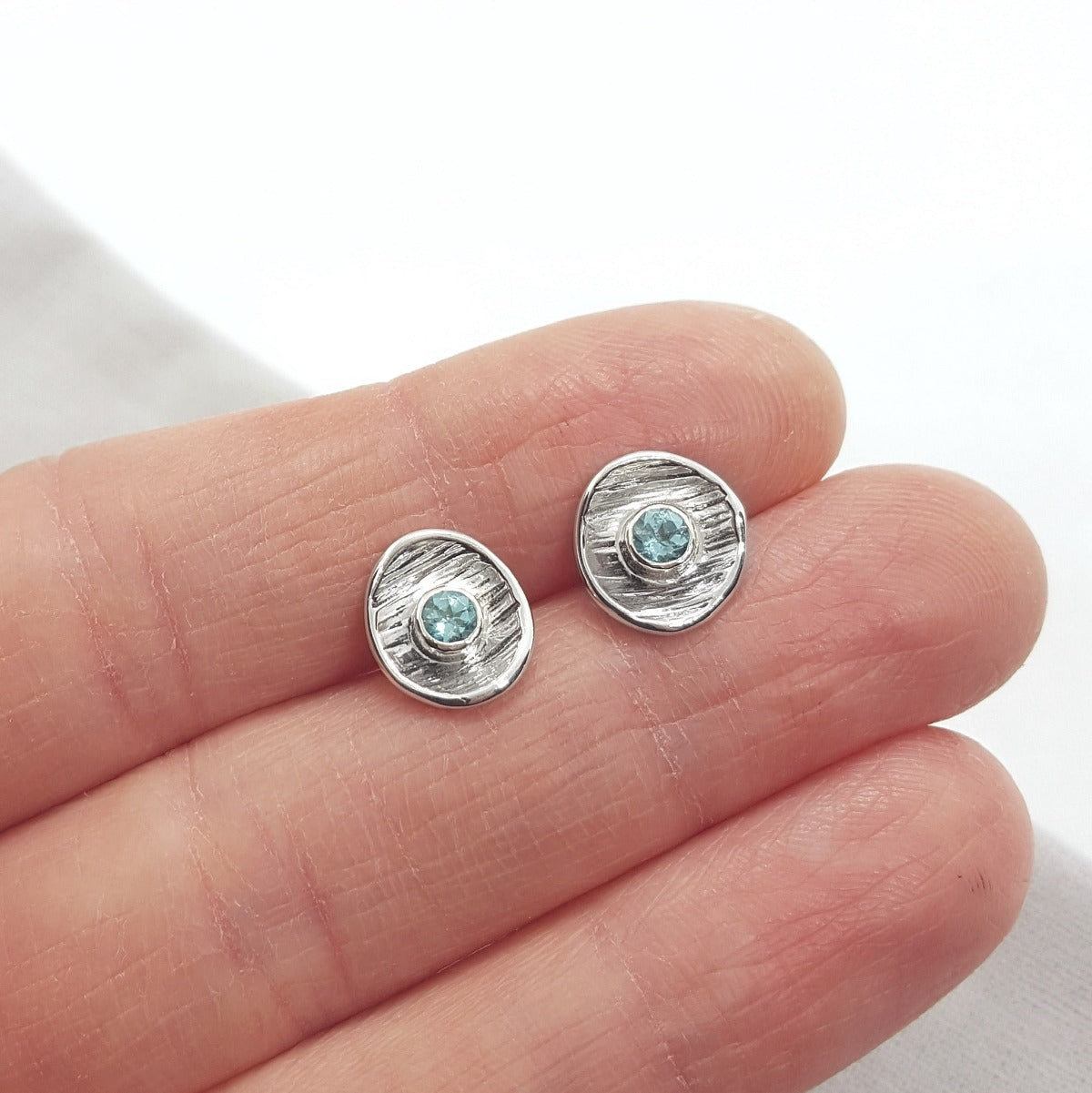 blue apatite gemstone and textured silver sup earrings, handmade in Kent