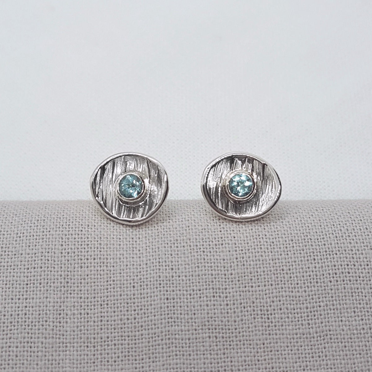 blue apatite gemstone and textured silver sup earrings, handmade in Kent