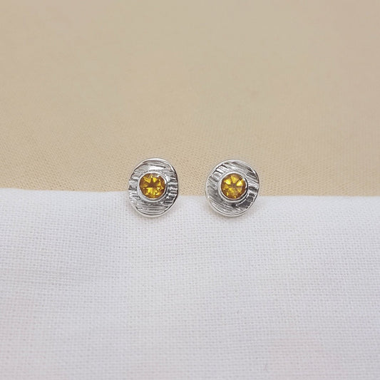 citrine set in textured sterling silver cups. Earrings handmade in Kent