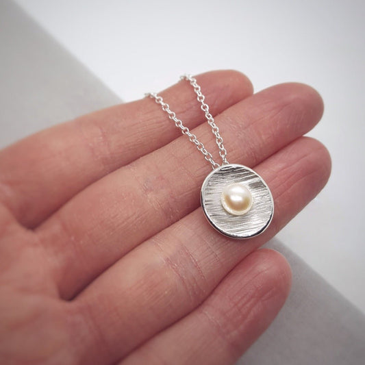 White pearl and silver handmade pendant