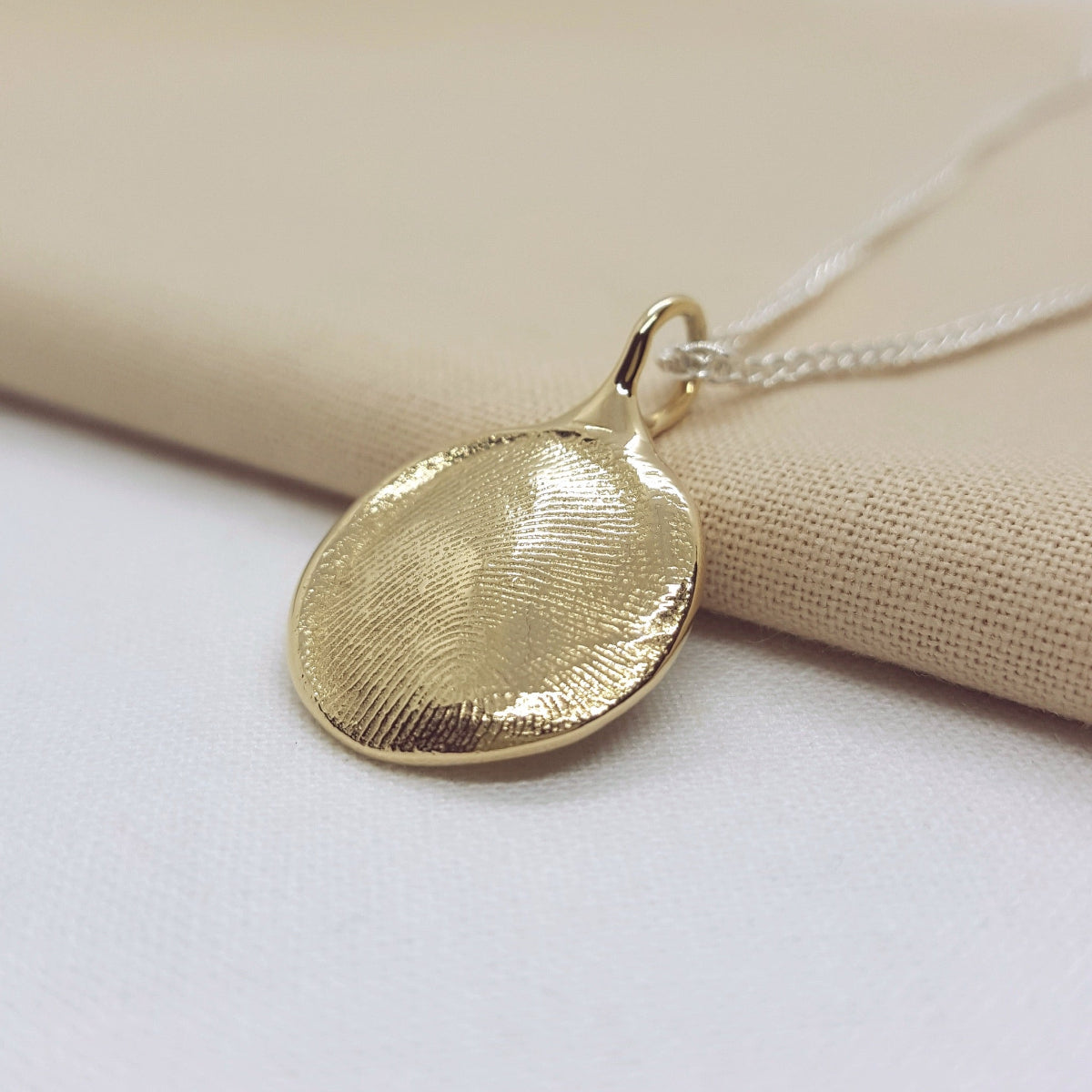 double sided yellow gold fingerprint pendant